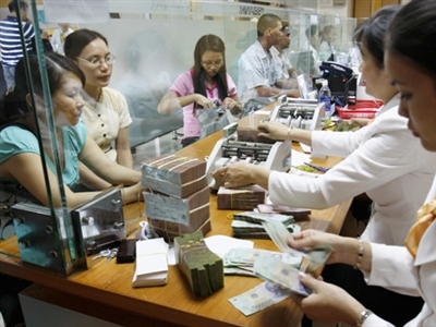 Cơ cấu lại hệ thống ngân hàng chính là xử lý sở hữu chéo. Ảnh: Ngọc Châu.