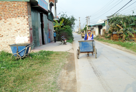Xây dựng nông thôn mới đã giúp cho các thôn, xã ở huyện Đông Triều có được môi trường xanh, sạch. Ảnh: Dương Trường