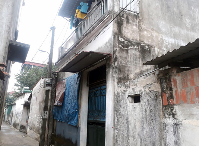 Ngôi nhà 2 tầng nơi xảy ra trọng án. Ảnh: H.L.