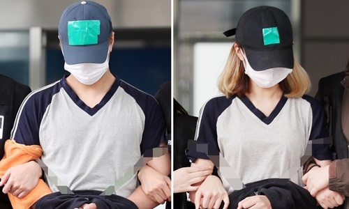 Cặp đôi được đưa tới tòa án ở Incheon hôm 7/6. Ảnh: Yonhap.